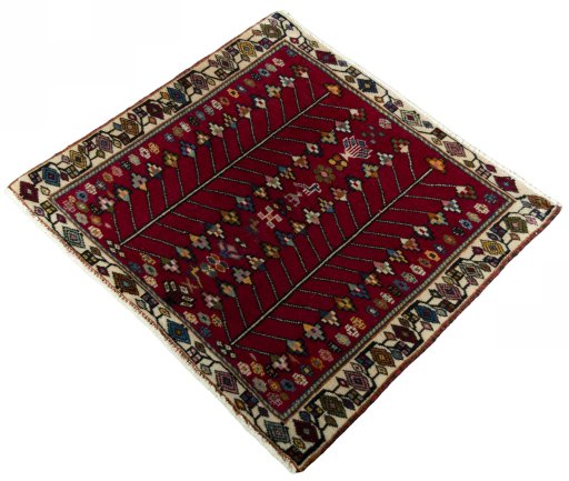 Corner detail of 2000s Shiraz rug showing border pattern and Wool pile