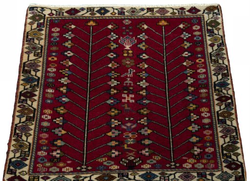 Surface texture of 2000s Shiraz rug with natural Wool and intricate pattern