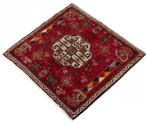 Corner detail of 2000s Shiraz rug showing border pattern and Wool pile