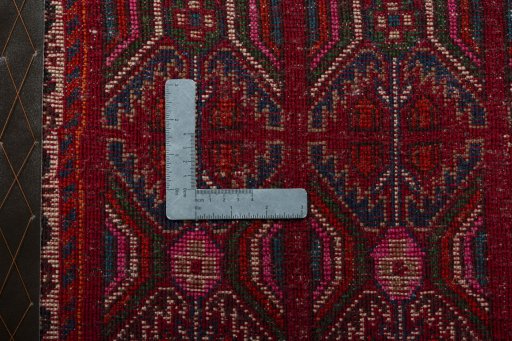 Backside of handmade 2000s Shiraz rug showing knot structure and weave density