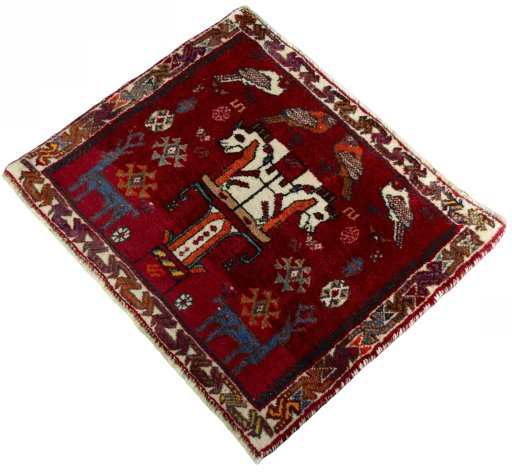 Corner detail of 2000s Shiraz rug showing border pattern and Wool pile