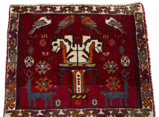 Surface texture of 2000s Shiraz rug with natural Wool and intricate pattern