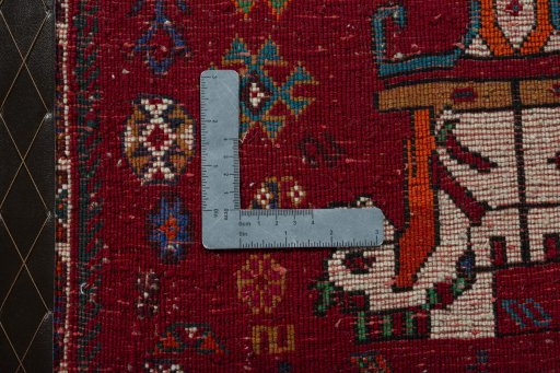 Backside of handmade 2000s Shiraz rug showing knot structure and weave density