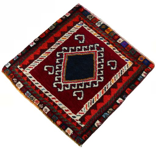 Corner detail of 2000s Shiraz rug showing border pattern and Wool pile