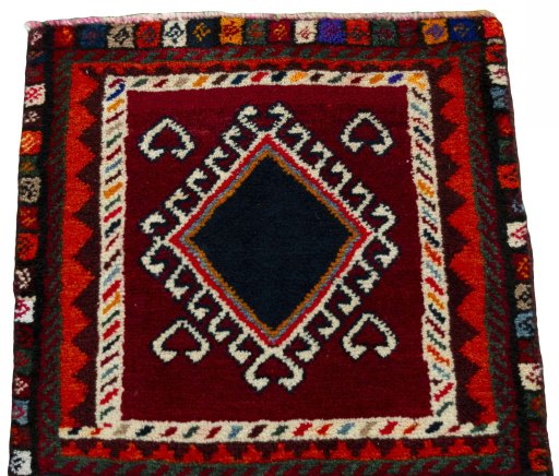 Surface texture of 2000s Shiraz rug with natural Wool and intricate pattern