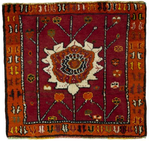 Full view of 2000s Shiraz rug from Iran / Persia, 57 × 60 cm in Red tones