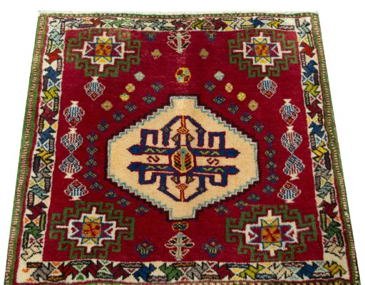 Surface texture of 2000s Shiraz rug with natural Wool and intricate pattern