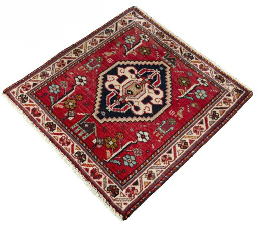Corner detail of 2000s Shiraz rug showing border pattern and Wool pile