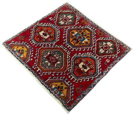 Corner detail of 2000s Shiraz rug showing border pattern and Wool pile