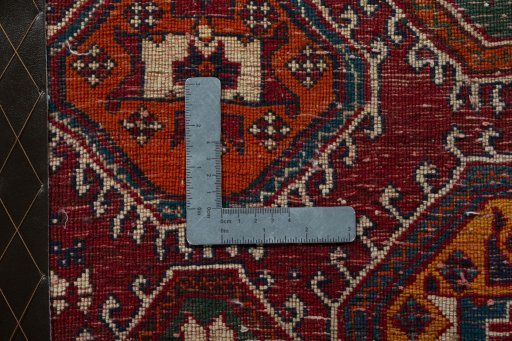 Backside of handmade 2000s Shiraz rug showing knot structure and weave density