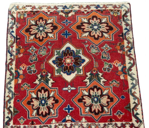 Surface texture of 2000s Shiraz rug with natural Wool and intricate pattern