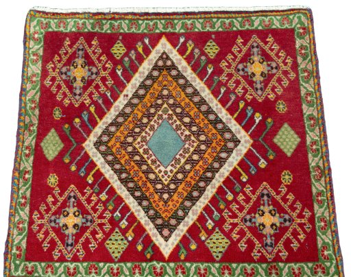 Surface texture of 2000s Shiraz rug with natural Wool and intricate pattern