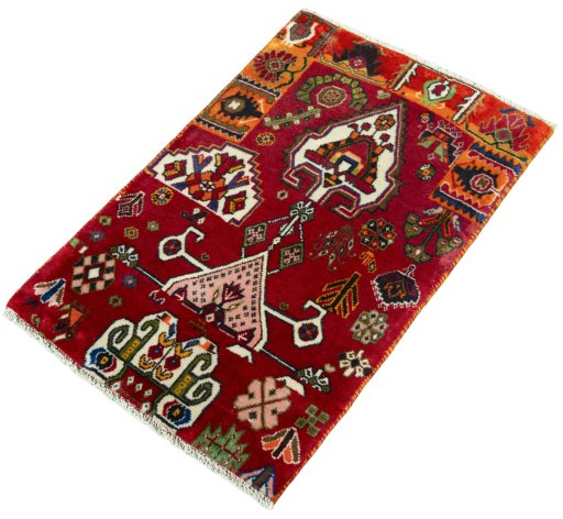 Corner detail of 2000s Shiraz rug showing border pattern and Wool pile