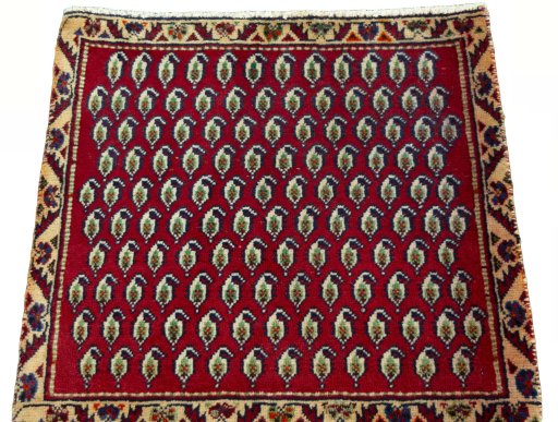Surface texture of 2000s Shiraz rug with natural Wool and intricate pattern