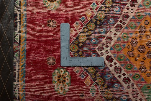 Backside of handmade 2000s Shiraz rug showing knot structure and weave density