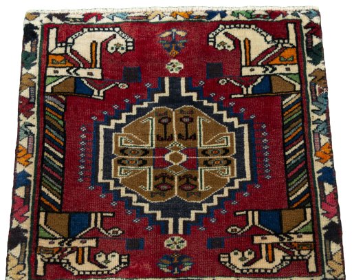 Surface texture of 2000s Shiraz rug with natural Wool and intricate pattern