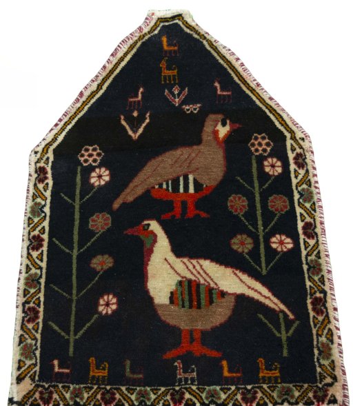 Surface texture of 2000s Shiraz rug with natural Wool and intricate pattern