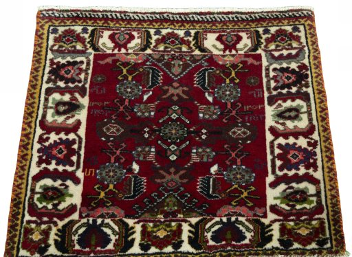 Surface texture of 2000s Shiraz rug with natural Wool and intricate pattern