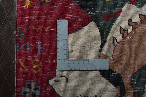 Backside of handmade 2000s Shiraz rug showing knot structure and weave density