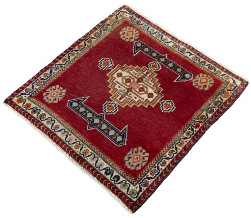 Corner detail of 2000s Shiraz rug showing border pattern and Wool pile