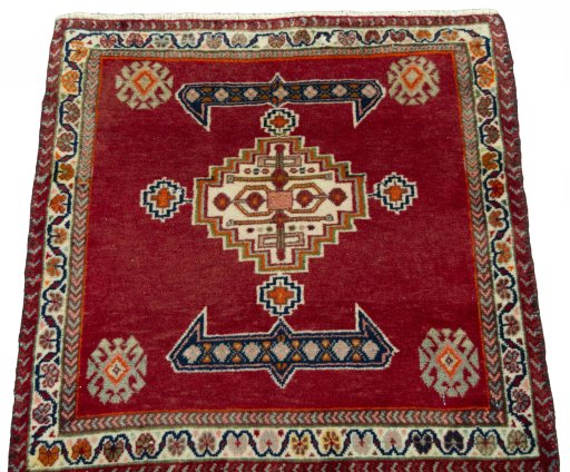 Surface texture of 2000s Shiraz rug with natural Wool and intricate pattern