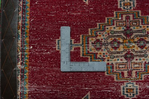 Backside of handmade 2000s Shiraz rug showing knot structure and weave density