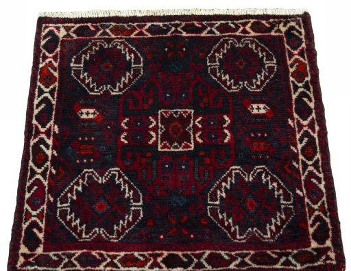 Surface texture of 2000s Shiraz rug with natural Wool and intricate pattern
