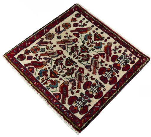 Corner detail of 2000s Shiraz rug showing border pattern and Wool pile