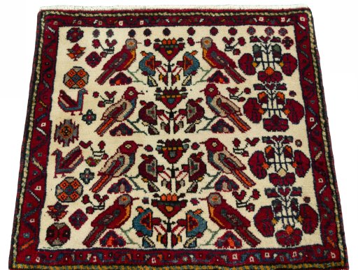 Surface texture of 2000s Shiraz rug with natural Wool and intricate pattern
