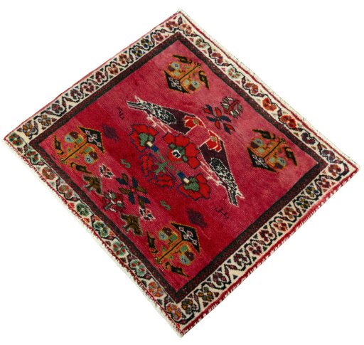 Corner detail of 2000s Shiraz rug showing border pattern and Wool pile