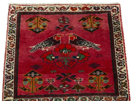Surface texture of 2000s Shiraz rug with natural Wool and intricate pattern