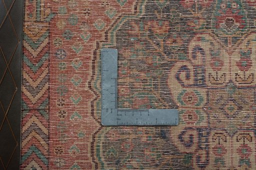 Backside of handmade 2000s Shiraz rug showing knot structure and weave density