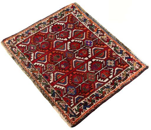 Corner detail of 2000s Shiraz rug showing border pattern and Wool pile