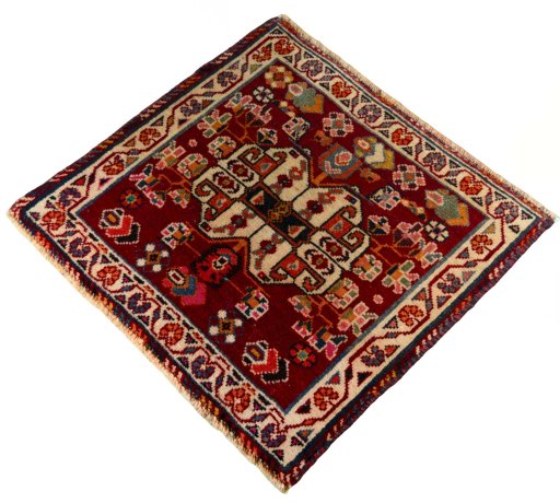 Corner detail of 2000s Shiraz rug showing border pattern and Wool pile