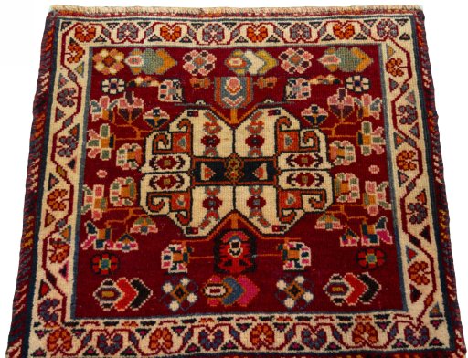 Surface texture of 2000s Shiraz rug with natural Wool and intricate pattern