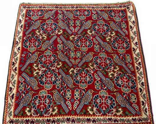 Surface texture of 2000s Shiraz rug with natural Wool and intricate pattern