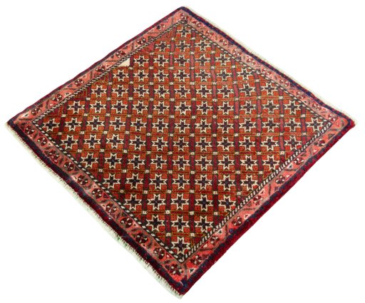 Corner detail of 2000s Shiraz rug showing border pattern and Wool pile