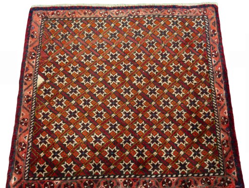 Surface texture of 2000s Shiraz rug with natural Wool and intricate pattern