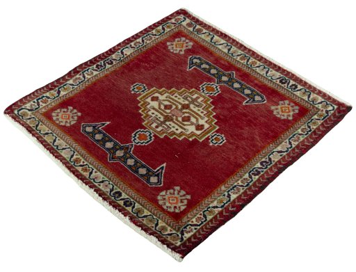 Corner detail of 2000s Shiraz rug showing border pattern and Wool pile