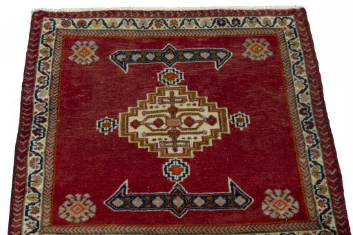 Surface texture of 2000s Shiraz rug with natural Wool and intricate pattern