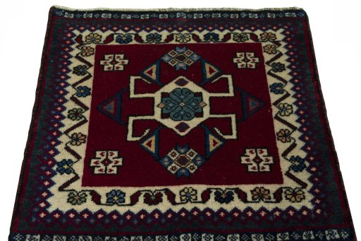 Surface texture of 2000s Shiraz rug with natural Wool and intricate pattern