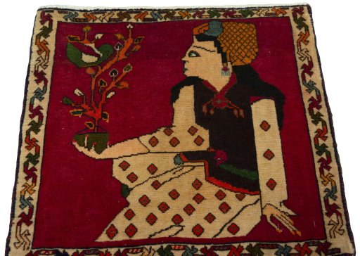 Surface texture of 2000s Shiraz rug with natural Wool and intricate pattern