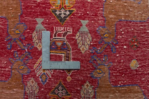 Backside of handmade 2000s Shiraz rug showing knot structure and weave density
