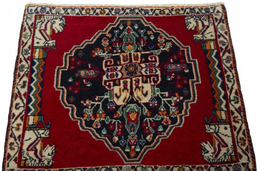 Surface texture of 2000s Shiraz rug with natural Wool and intricate pattern