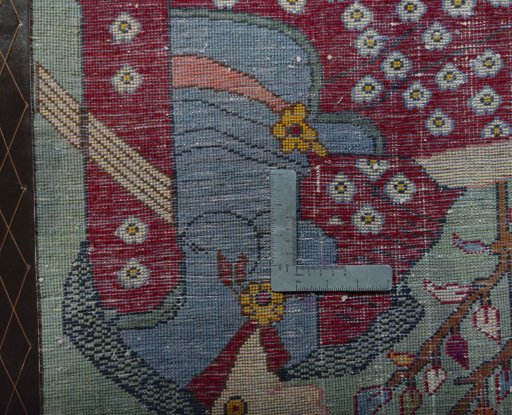 Backside of handmade 2000s Shiraz rug showing knot structure and weave density