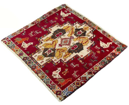 Corner detail of 2000s Shiraz rug showing border pattern and Wool pile