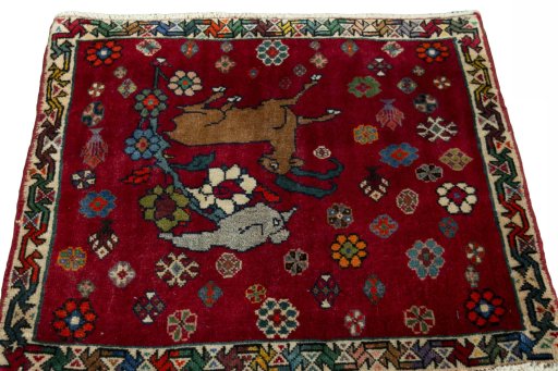 Surface texture of 2000s Shiraz rug with natural Wool and intricate pattern