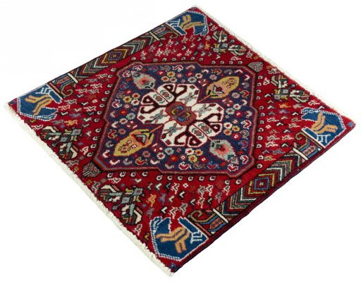 Corner detail of 2000s Shiraz rug showing border pattern and Wool pile