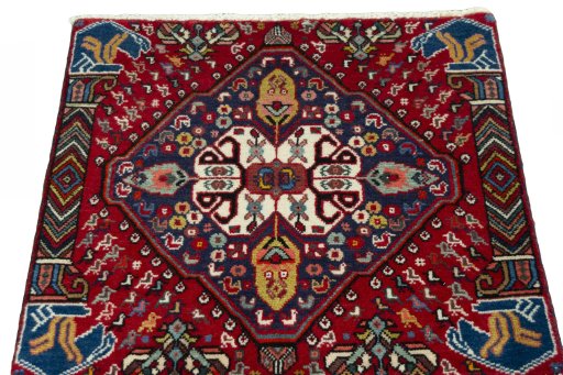 Surface texture of 2000s Shiraz rug with natural Wool and intricate pattern