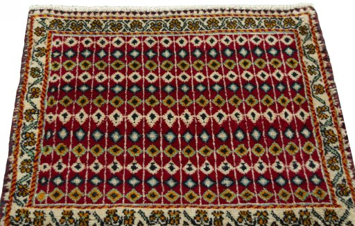 Surface texture of 2000s Shiraz rug with natural Wool and intricate pattern